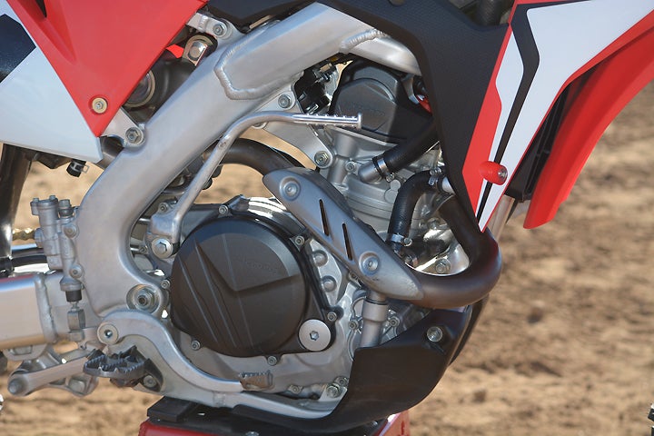 The CRF’s Unicam Single attains its increased power via a new downdraft intake layout, a new cylinder head and increased compression along with a more aggressive camshaft. The Honda churned out 52.5 horsepower at 8900 rpm on the dyno.