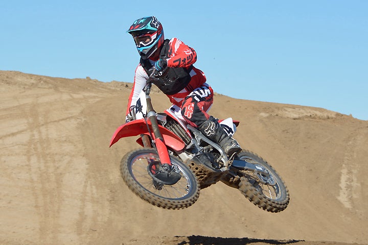 The Honda CRF450R feels small and light, making it easy to throw around in the air and comfortable during long motos.